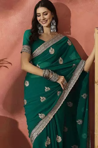 Green ethnic motifs embroidered saree