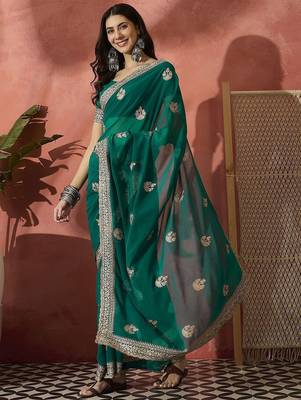 Green ethnic motifs embroidered saree 3