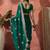 Green ethnic motifs embroidered saree
