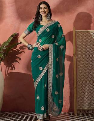 Green ethnic motifs embroidered saree 5