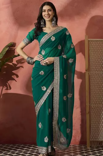 Green ethnic motifs embroidered saree