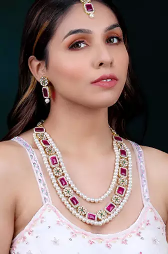 Gold plated rani pink & green kundan synthetic stone & beads studded