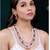 Gold plated rani pink & green kundan synthetic stone & beads studded