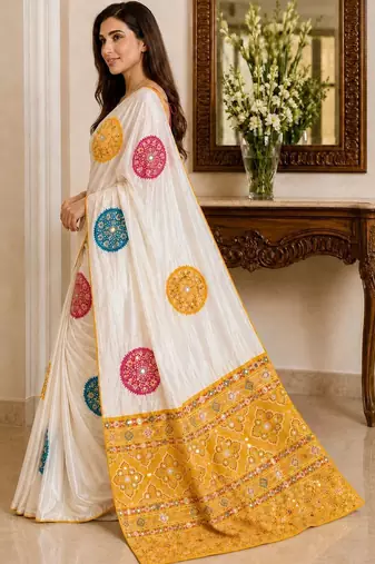 Cream embellished mirror work poly crepe designer saree