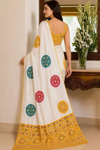 Cream embellished mirror work poly crepe designer saree