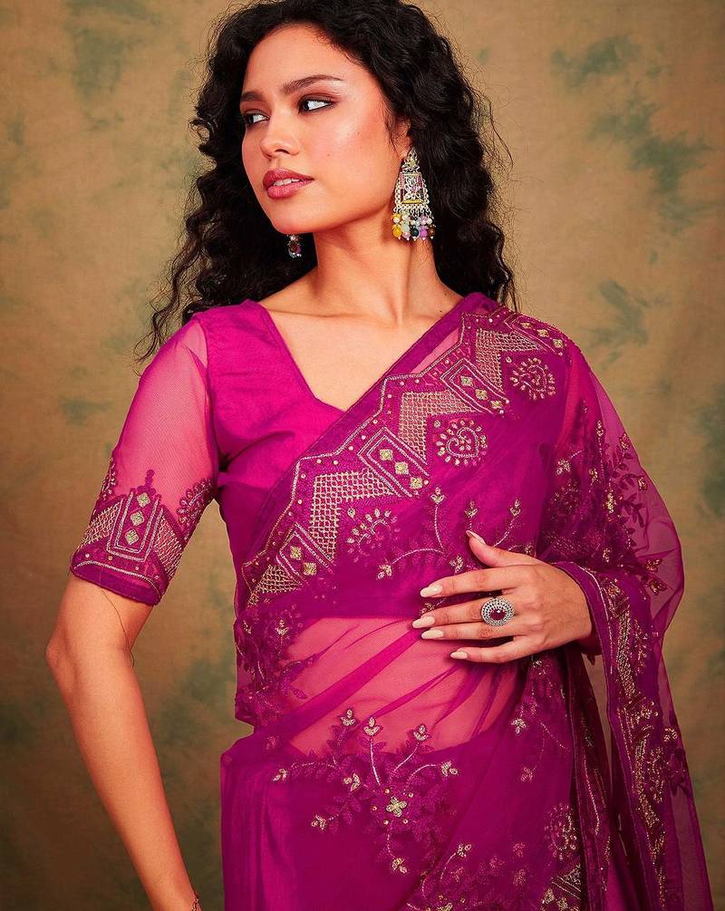 Pink ethnic motifs embroidered net sarees