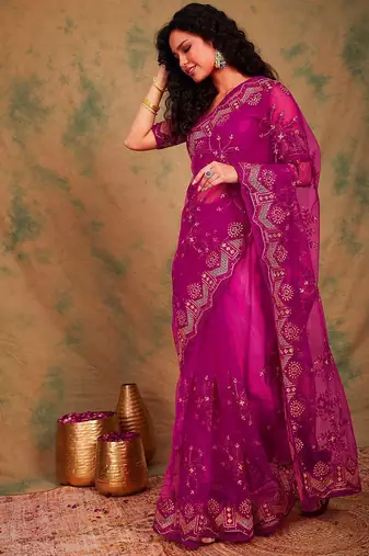 Pink ethnic motifs embroidered net sarees