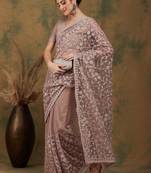Beige floral embroidered net saree