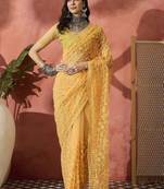 Yellow embroidered saree with blouse piece