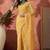 Yellow embroidered saree with blouse piece