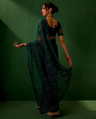 Teal embroidered sarees 5