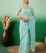 Sea green embroidered saree with blouse piece