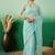 Sea green embroidered saree with blouse piece
