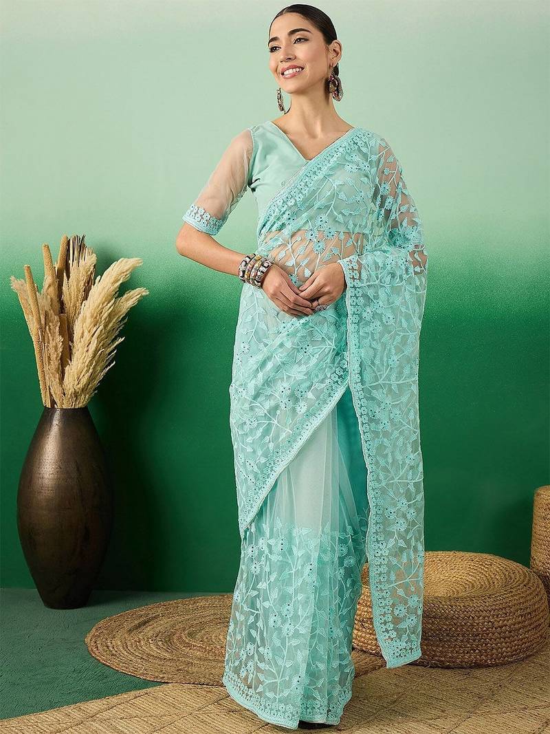 Sea green embroidered saree with blouse piece