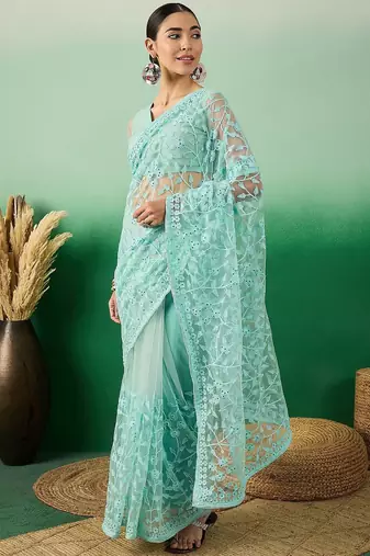 Sea green embroidered saree with blouse piece