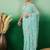 Sea green embroidered saree with blouse piece