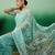 Sea green embroidered saree with blouse piece