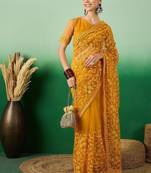Mustard embroidered net saree with blouse piece