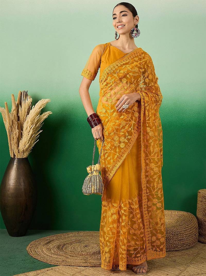 Mustard embroidered net saree with blouse piece