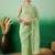 Green floral embroidered net saree