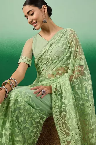 Green floral embroidered net saree