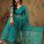 Teal embroidered saree with blouse piece
