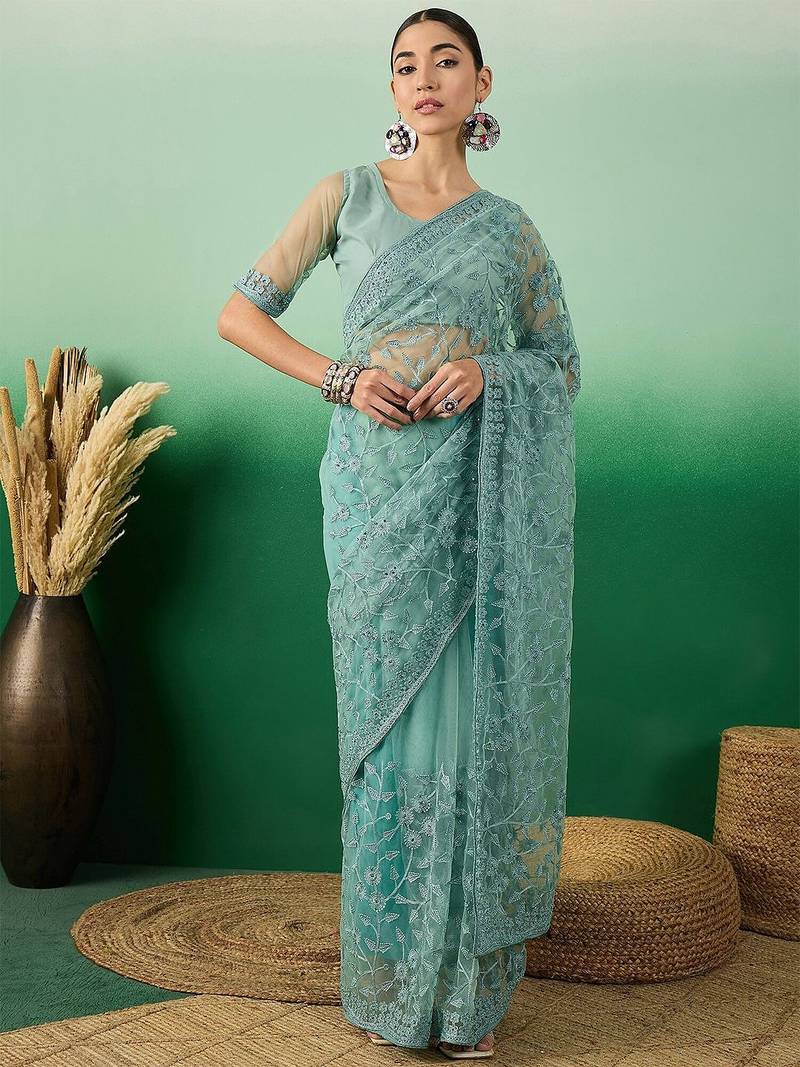 Teal embroidered beads and stones net saree