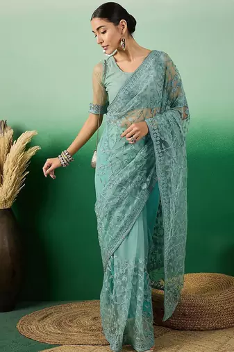 Teal embroidered beads and stones net saree