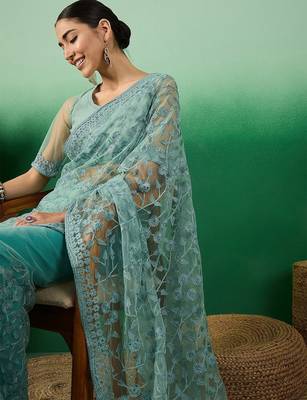 Teal embroidered beads and stones net saree 5