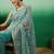 Teal embroidered beads and stones net saree