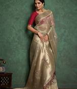 Beige woven design paithani saree withblousepiece
