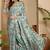 Green floral printed satin saree with blouse piece