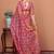 Pink ethnic motifs printed saree with unstitched blouse