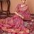 Pink ethnic motifs printed saree with unstitched blouse