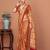 Rust ethnic motifs printed zari banarasi saree