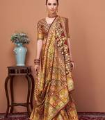 Brown women ethnic motifs printed festive wear saree with matching unstitched blouse