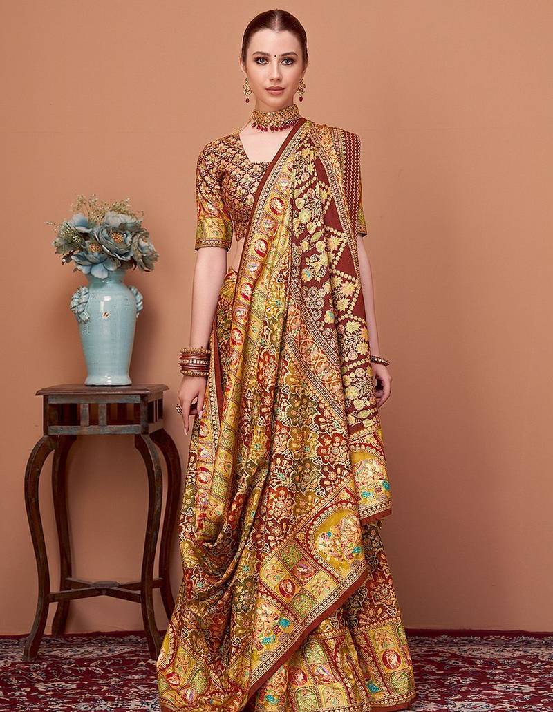 Brown women ethnic motifs printed festive wear saree with matching unstitched blouse