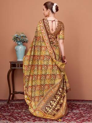 Brown women ethnic motifs printed festive wear saree with matching unstitched blouse 2