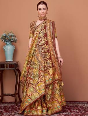 Brown women ethnic motifs printed festive wear saree with matching unstitched blouse 3