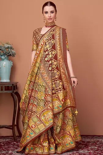 Brown women ethnic motifs printed festive wear saree with matching unstitched blouse