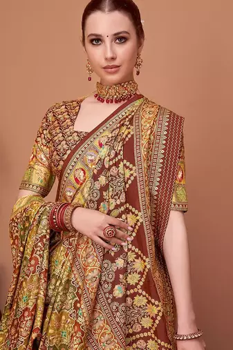 Brown women ethnic motifs printed festive wear saree with matching unstitched blouse