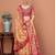 Beige women ethnic motifs printed festive wear saree with matching unstitched blouse