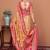 Beige women ethnic motifs printed festive wear saree with matching unstitched blouse