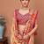 Beige women ethnic motifs printed festive wear saree with matching unstitched blouse