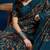 Teal ethnic motifs printed saree with unstitched blouse piece
