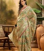 Green floral woven design organza saree with unstitched blouse