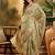 Green floral woven design organza saree with unstitched blouse