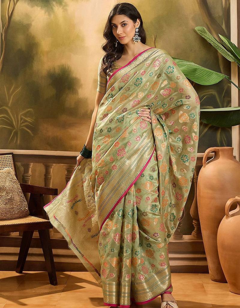 Green floral woven design organza saree with unstitched blouse