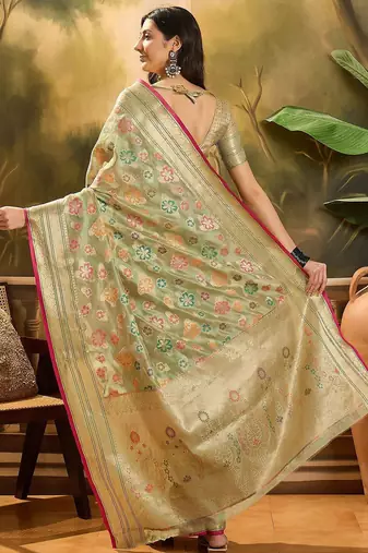 Green floral woven design organza saree with unstitched blouse