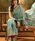 Blue floral woven design organza banarasi saree with blousepiece